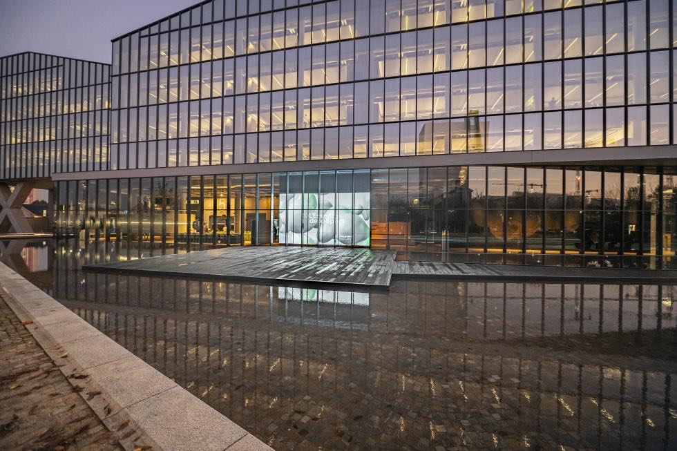 STEP FuturAbility District glass facade and reflecting pool
